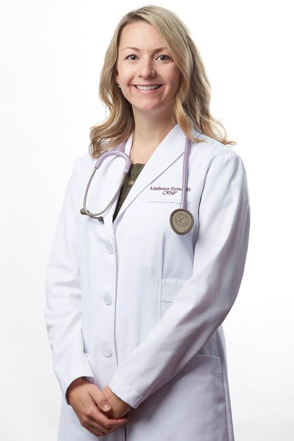 Melissa Schmidt, CRNP in lab coat