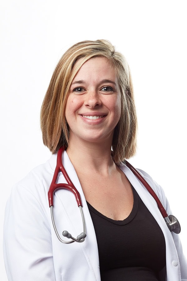 Samantha Morgan, PA in lab coat smiling
